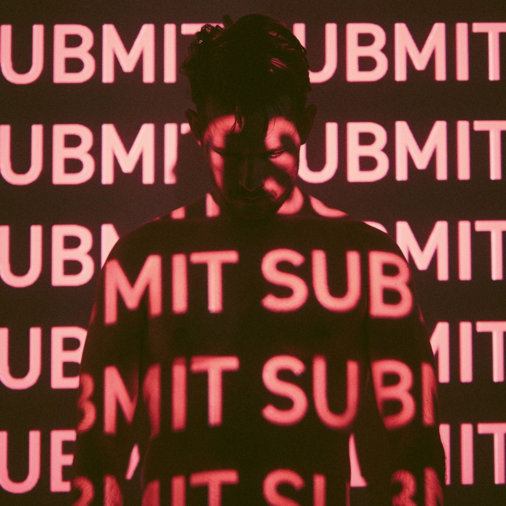 man with submit text