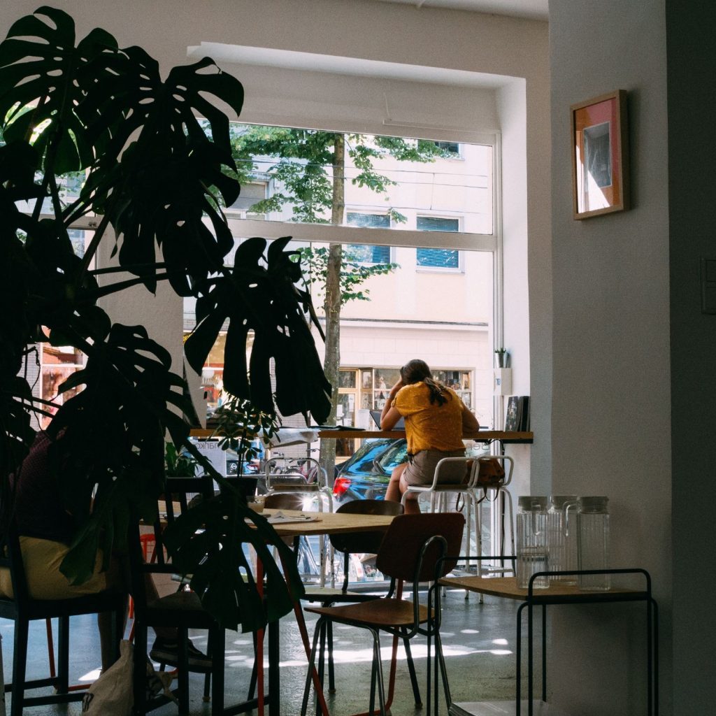 girl alone in restaurant